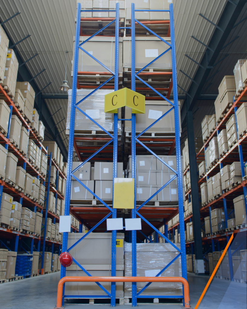 A warehouse with shelves full of products and labeled boxes for international shipments